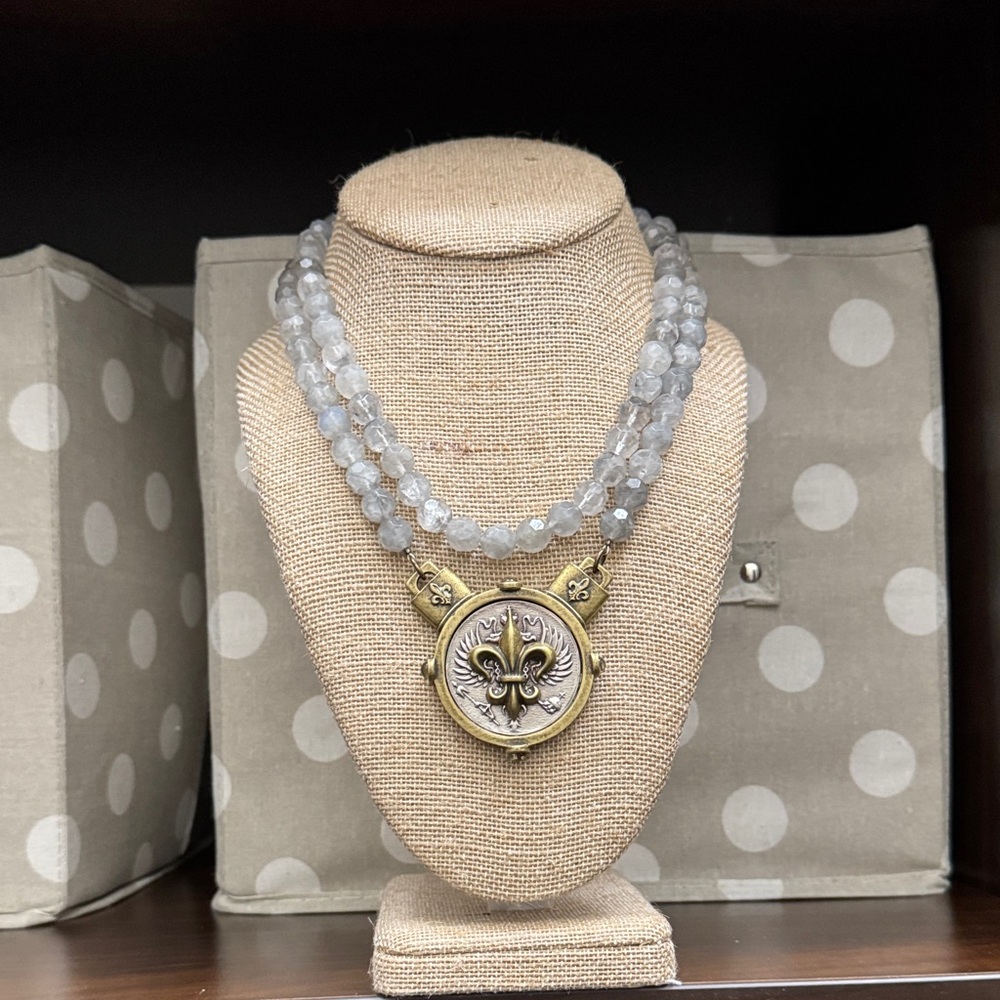 Elegant Silver and Brass Fleur-de-Lis Necklace